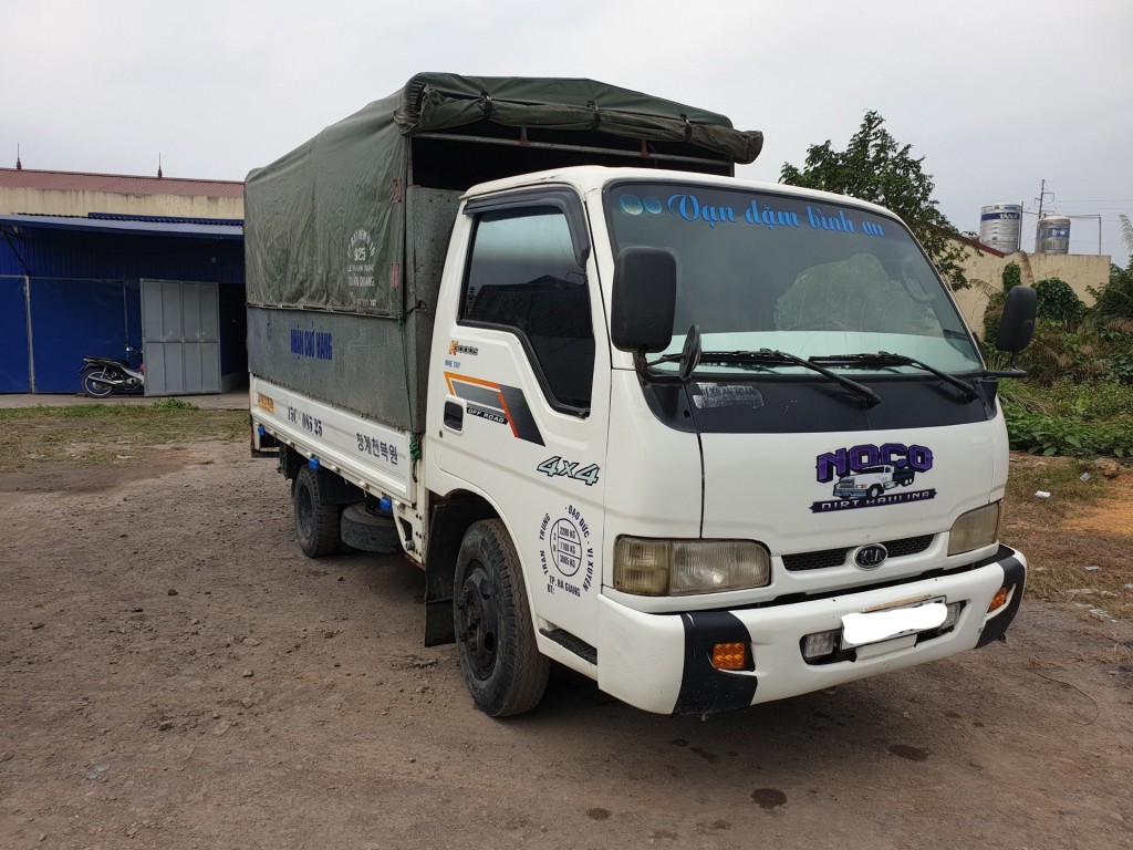 kia-cu-2005-1t4